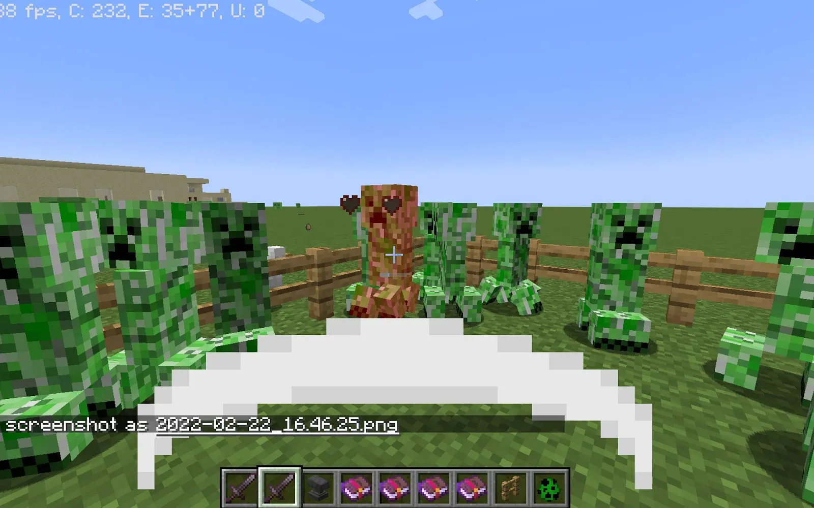 An image of a group of creepers being hit with a sword using knockback.