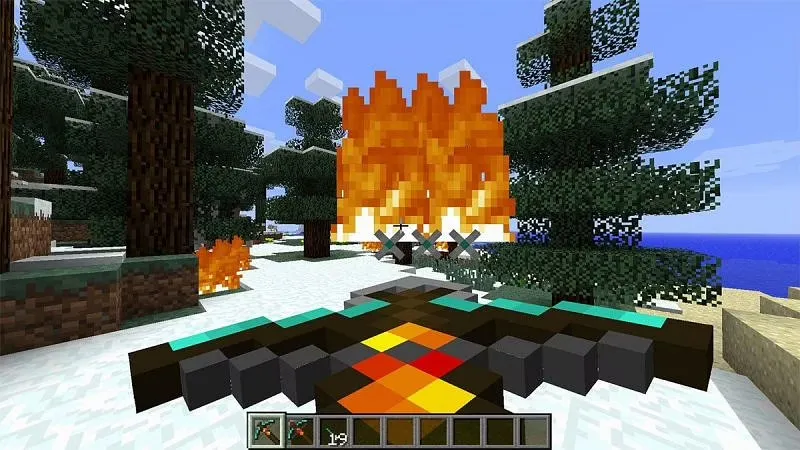 An image showing three arrows on fire in Minecraft