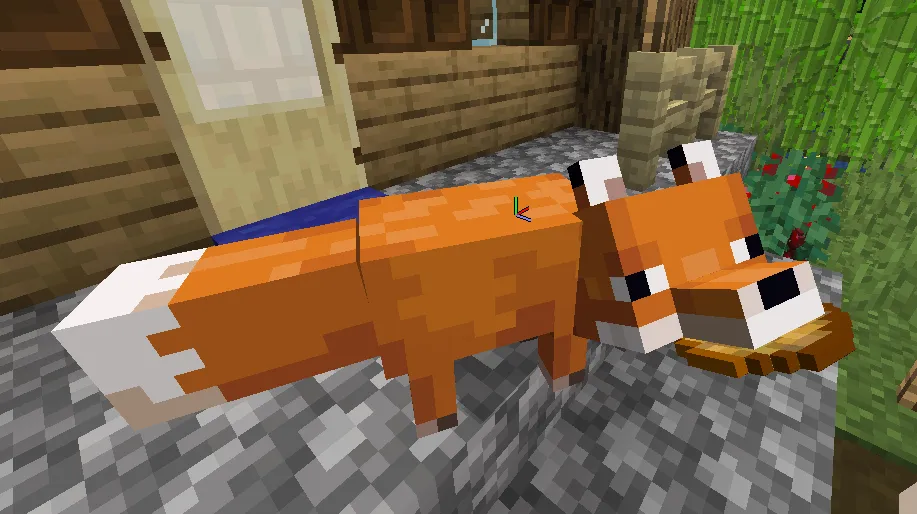 An image of a fox holding a potato in Minecraft