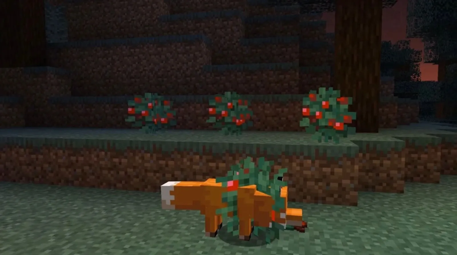 An image of a fox in a sweet berry bush in Minecraft