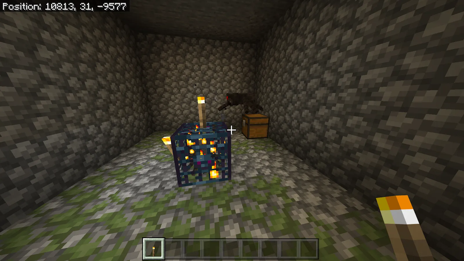 An image of a spider spawner and one spider in the background