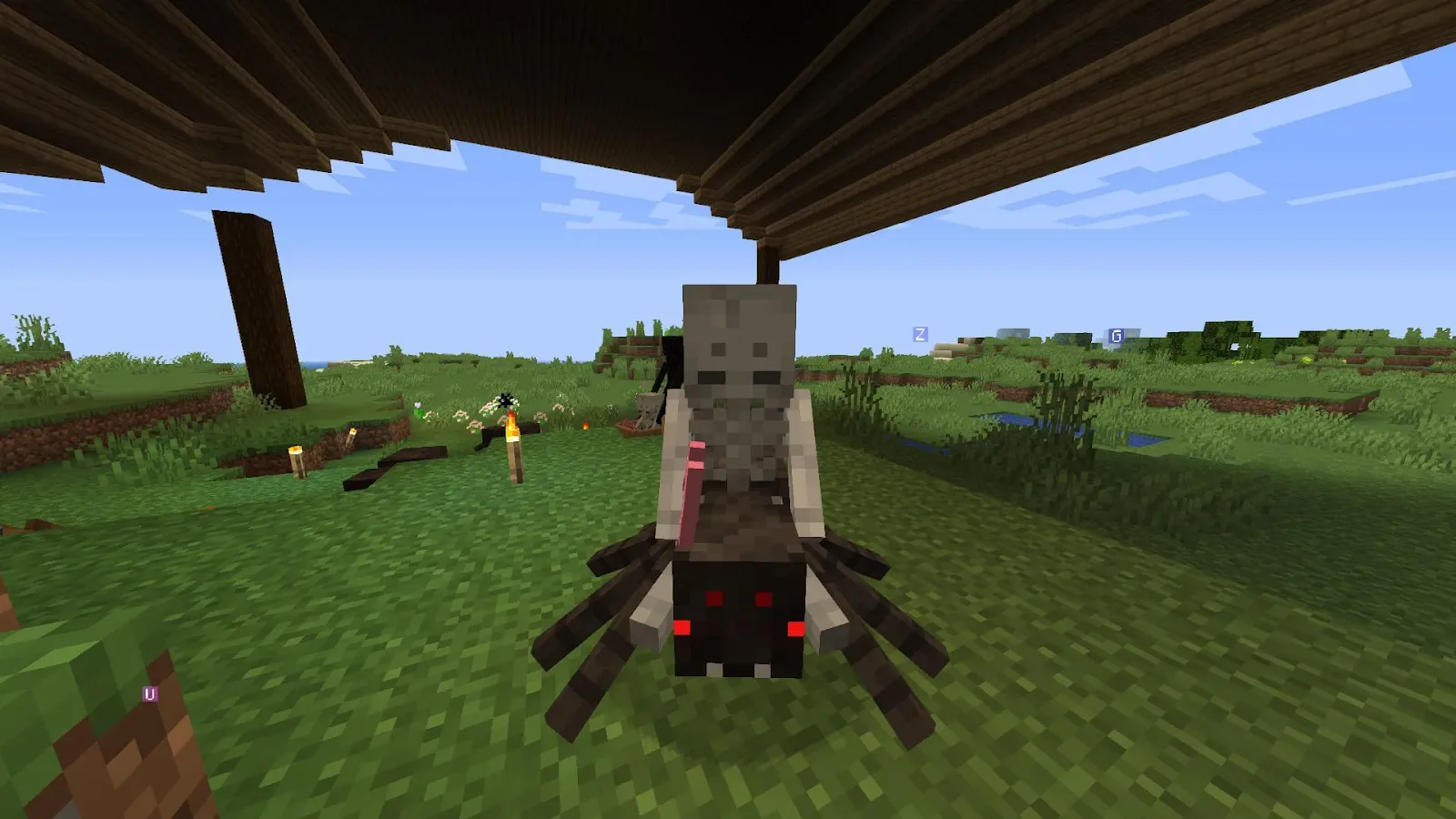 An image of a spider jockey in Minecraft